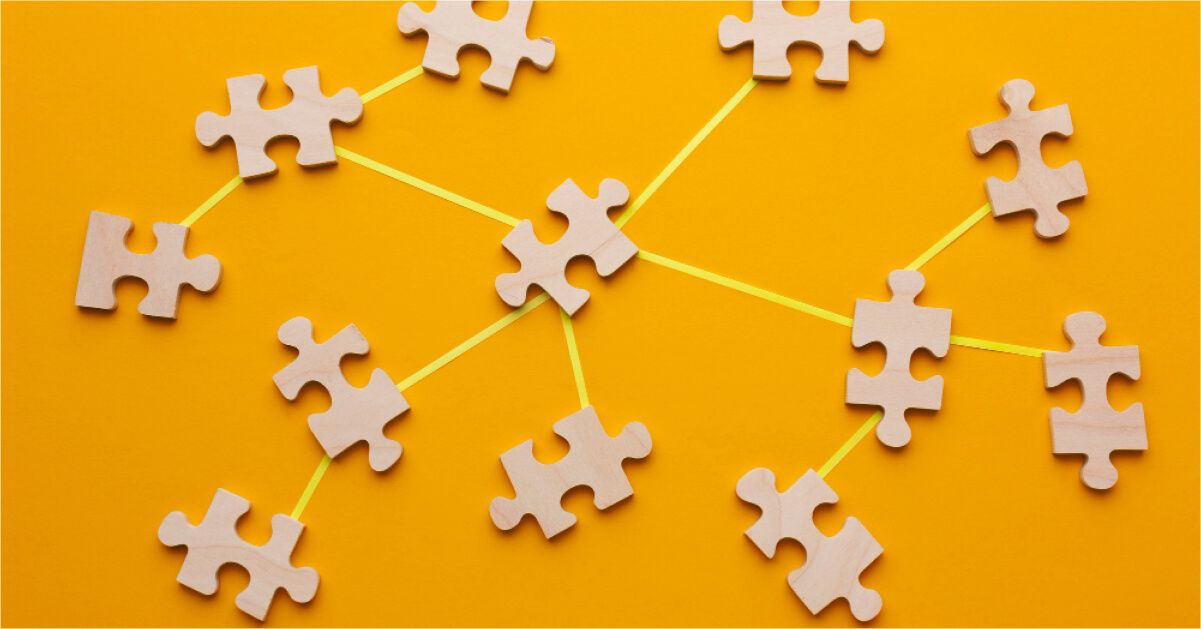 Puzzle pieces connected by yellow lines