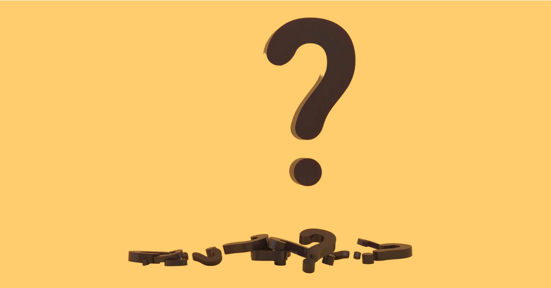 Set of question marks against an yellow backdrop