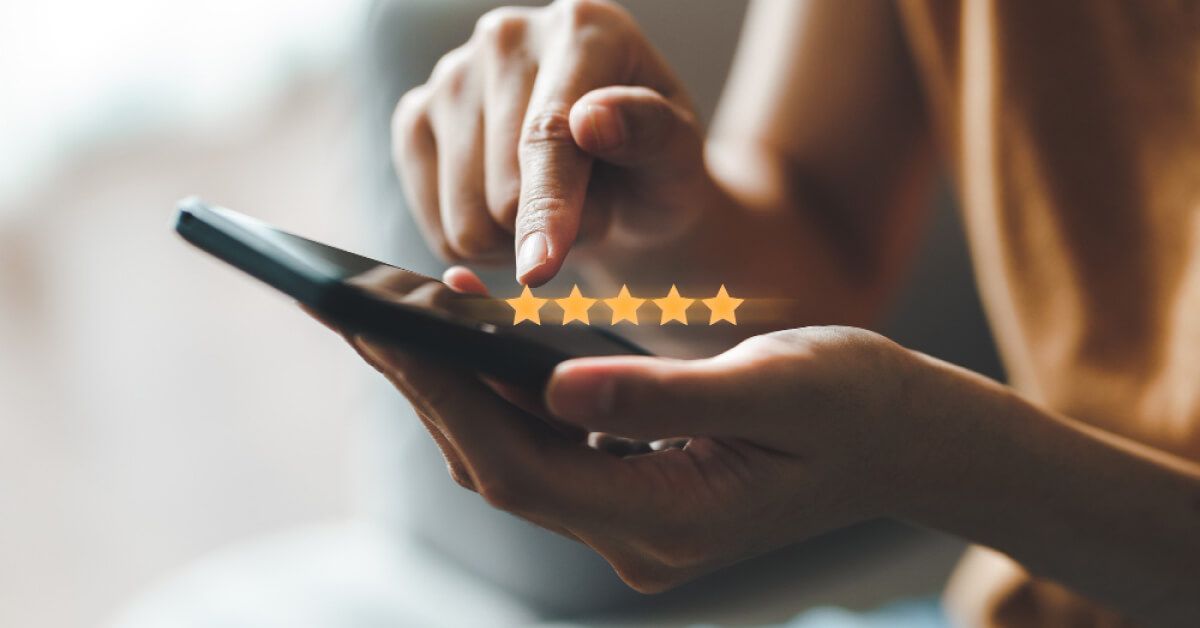Person using a phone with holographic rating scale over it
