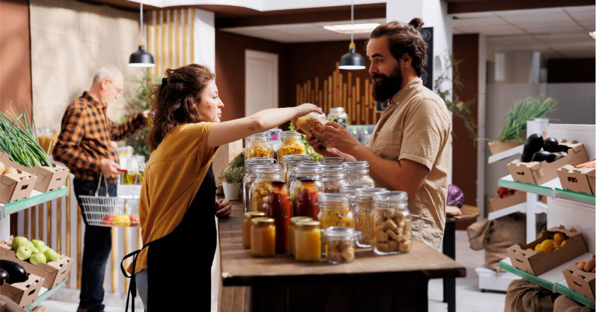 Retail worker helping a customer