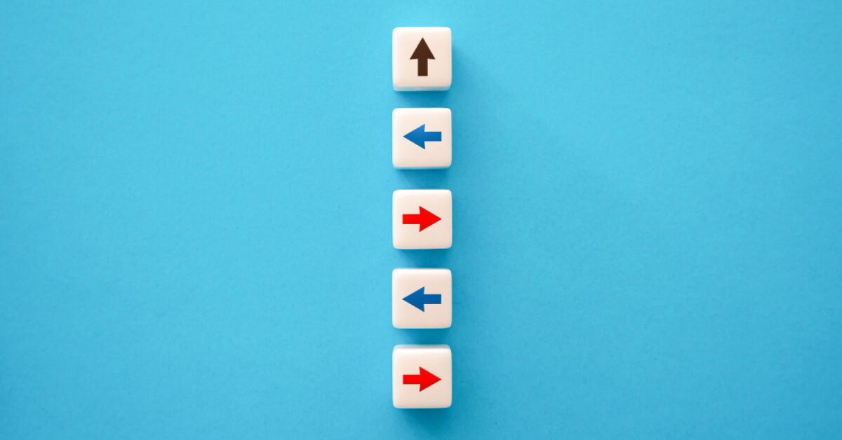 Stack of white blocks with arrows