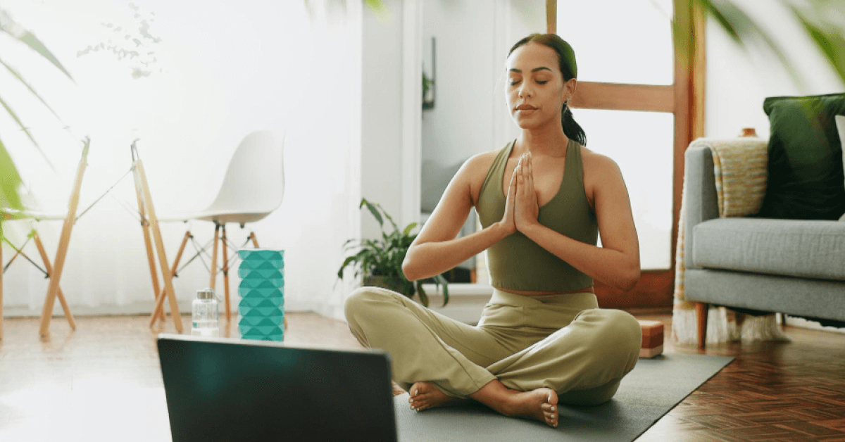 Employee meditating in a work from home setup