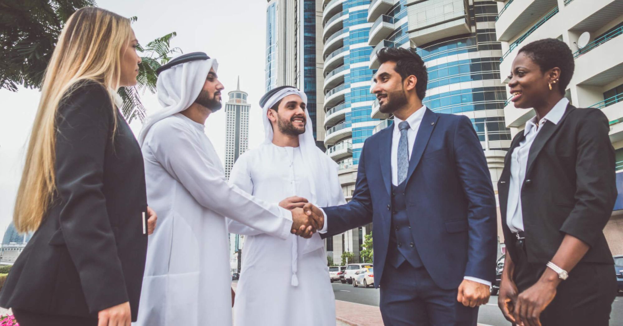People shaking hands with each other