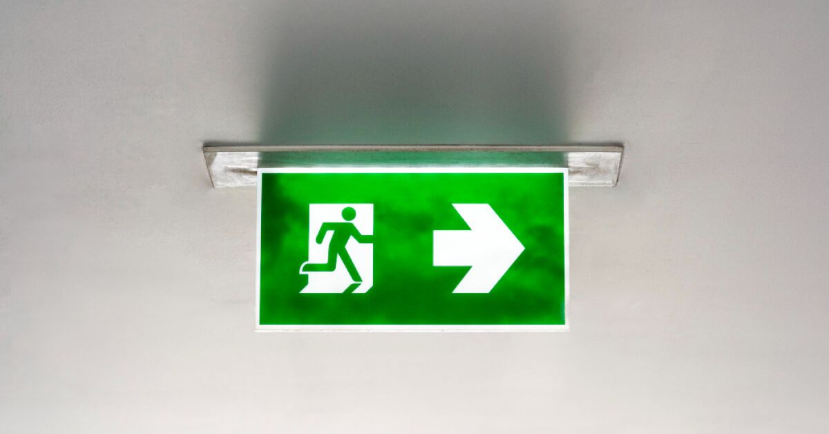 Exit sign leading to a direction