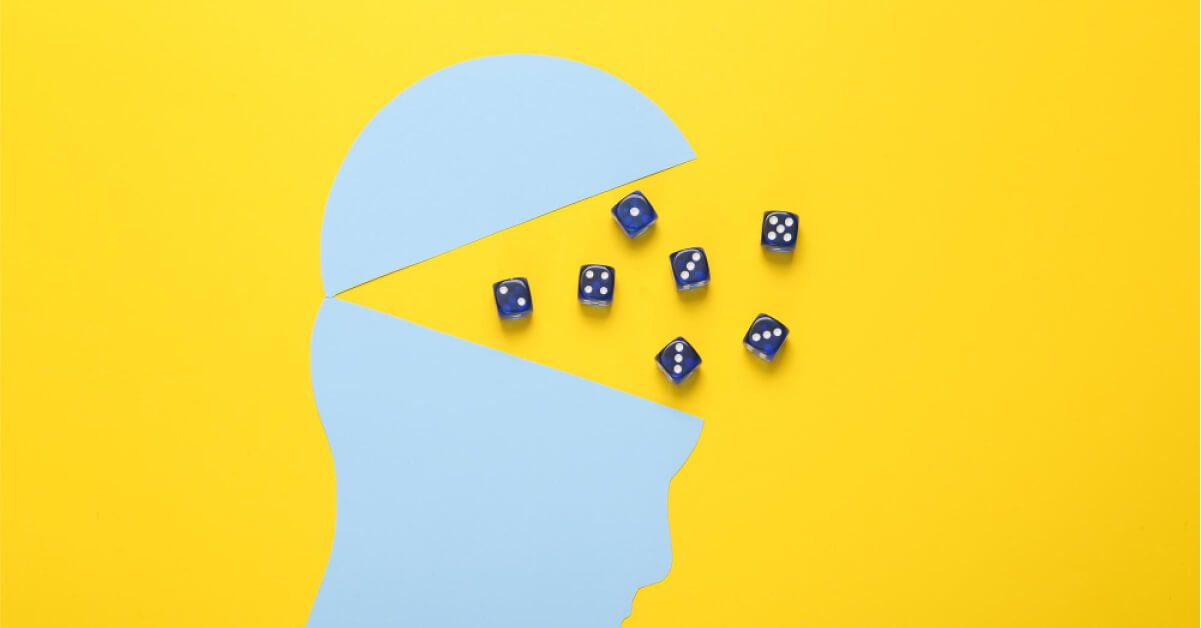 Dices scattered on a chart of a head