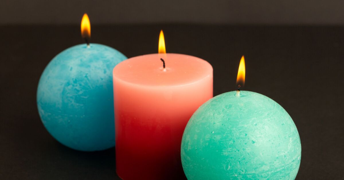 Red blue and green candles designed lighting isolated melting light fire flame