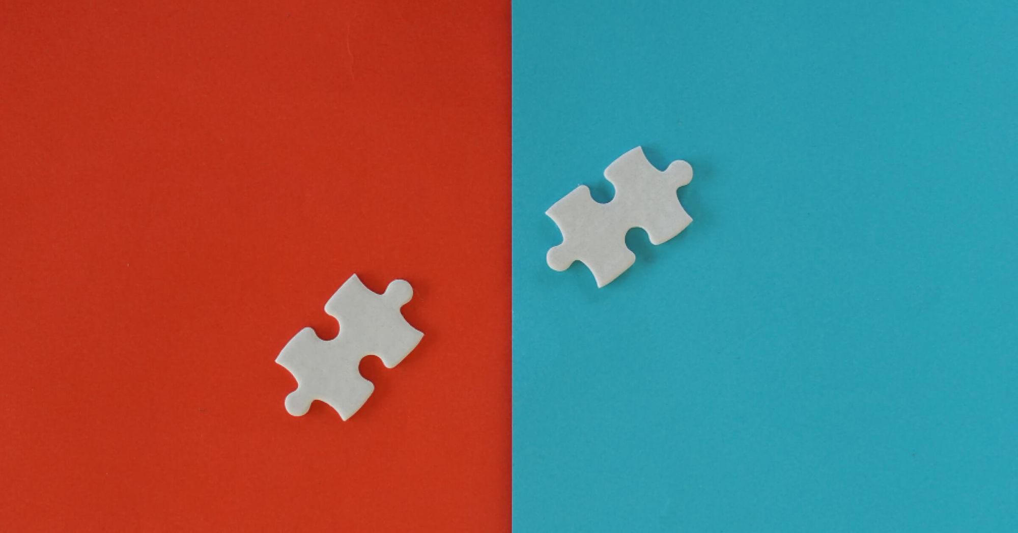 Puzzle pieces in sheets of red and blue