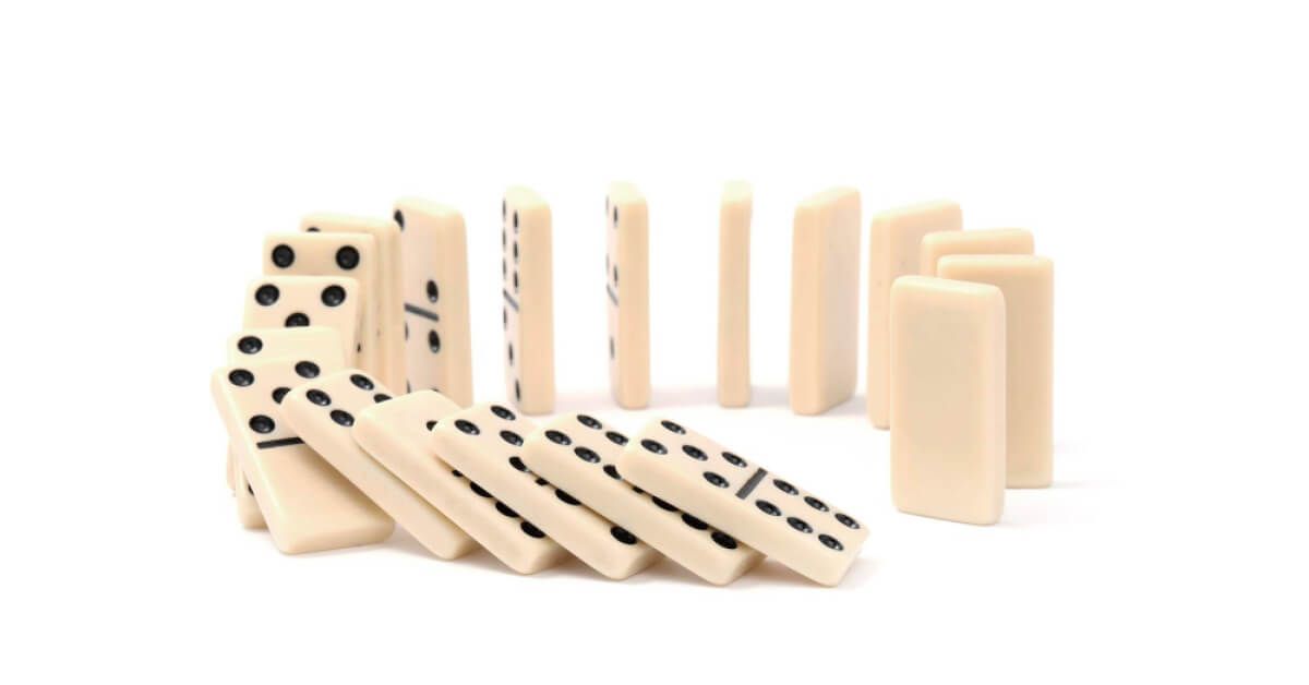 Dominoes falling on each other