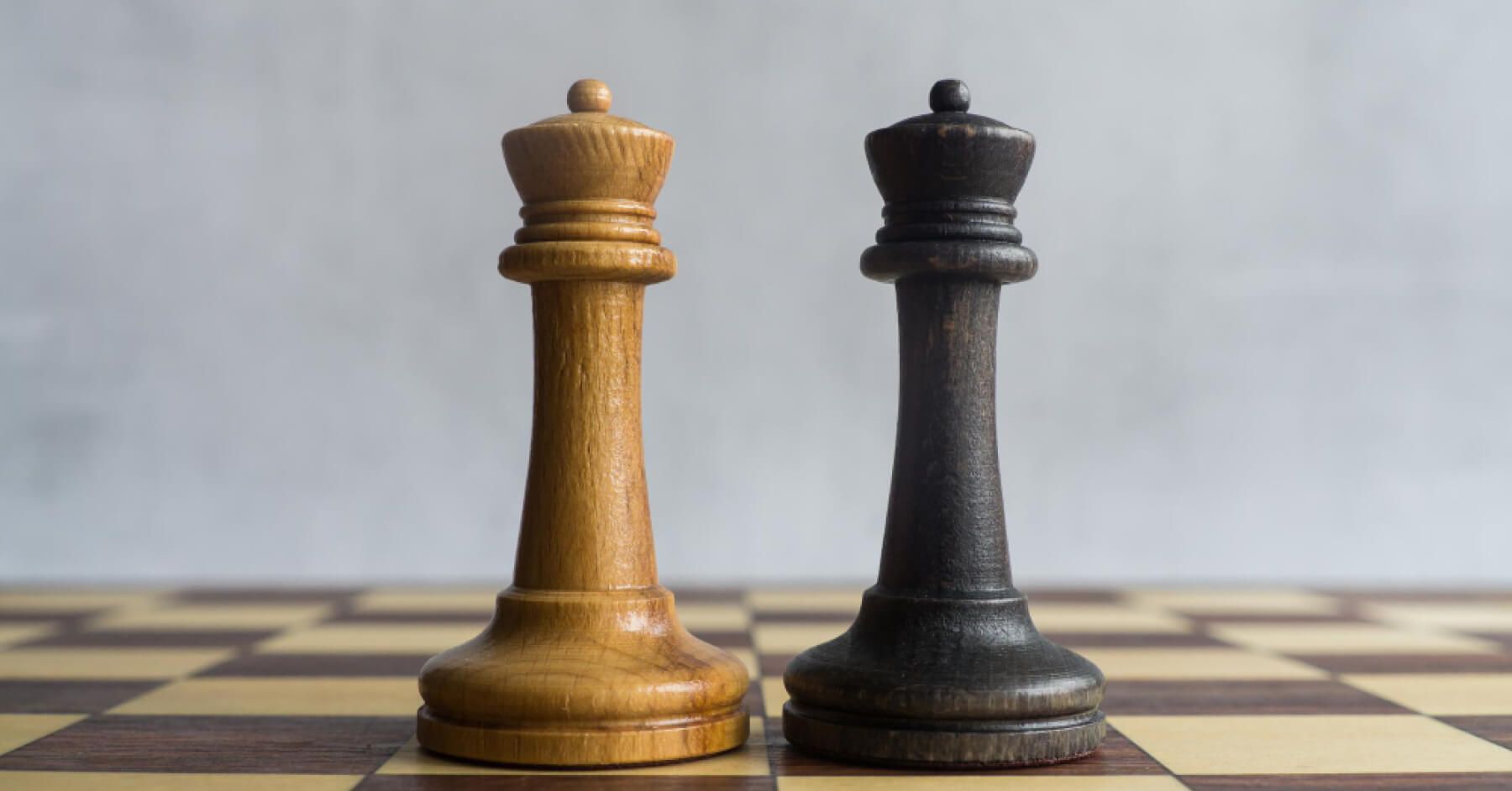 White and black pawns on a chess board