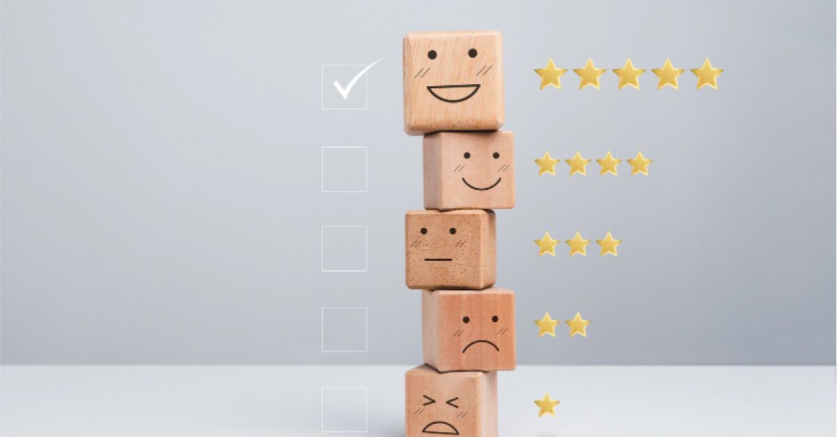 Wooden blocks with emotions and stars