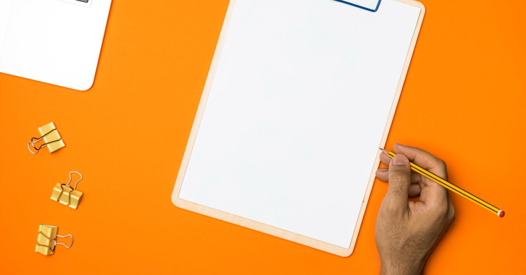 Writing on an empty paper with a pencil