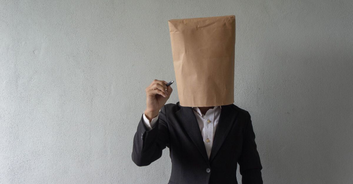Person with a paper bag over their head