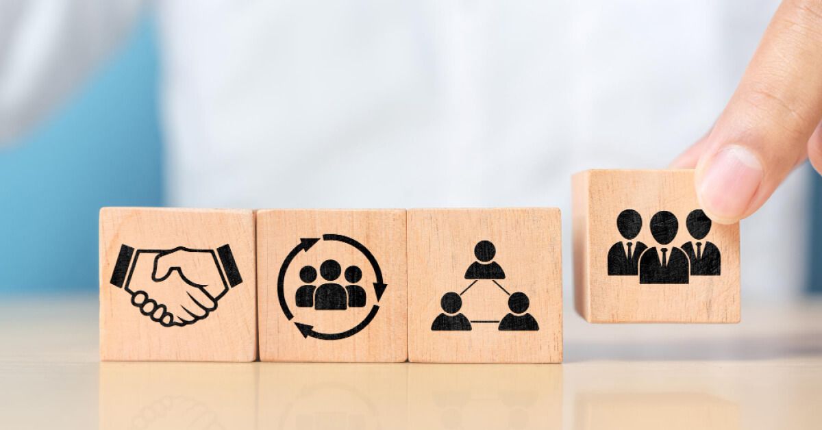 Wooden blocks of managers and career development