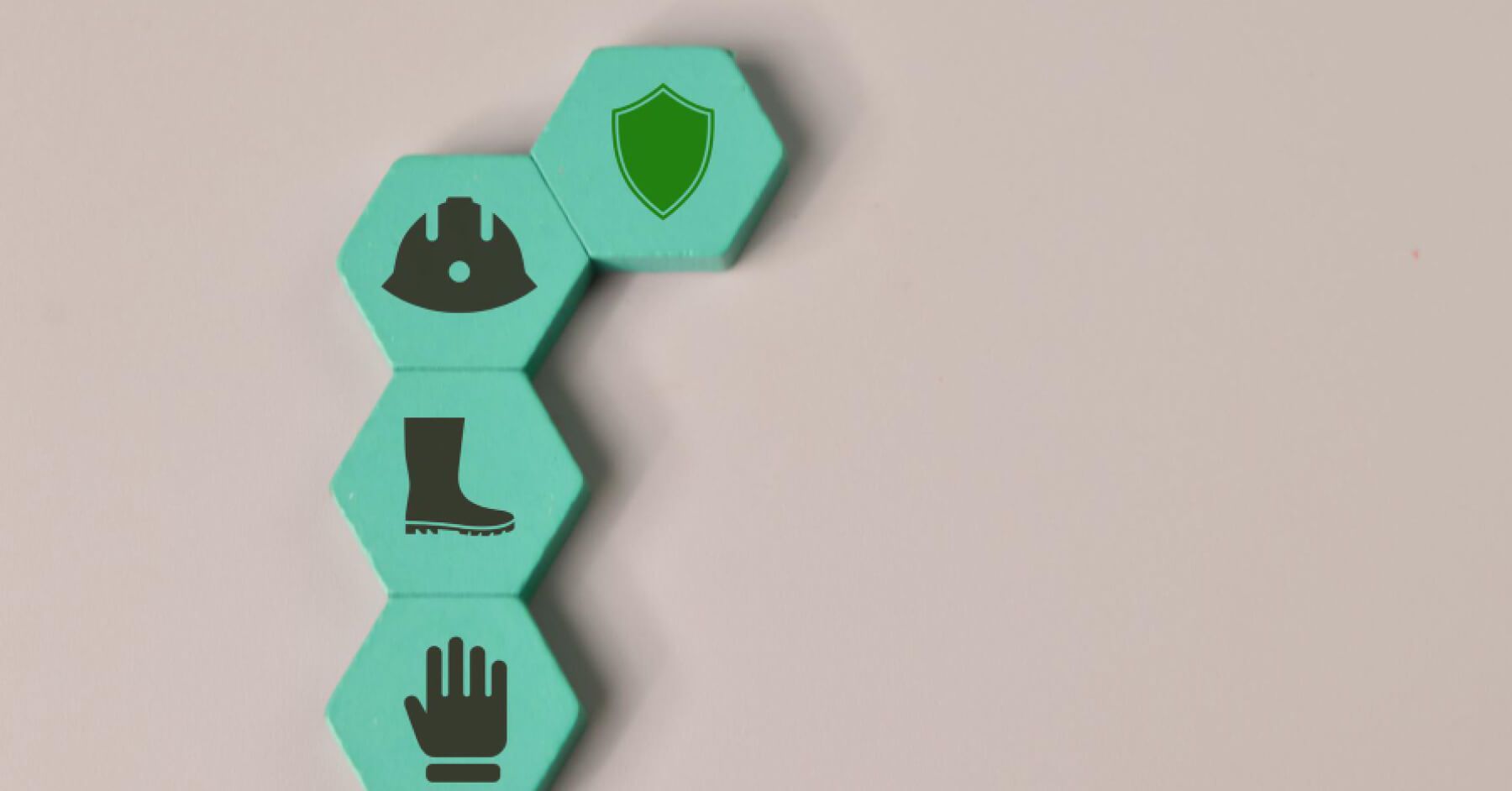 Green blocks of blue collar workers safety gears