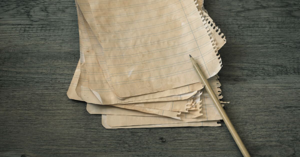 Old paper with pencil