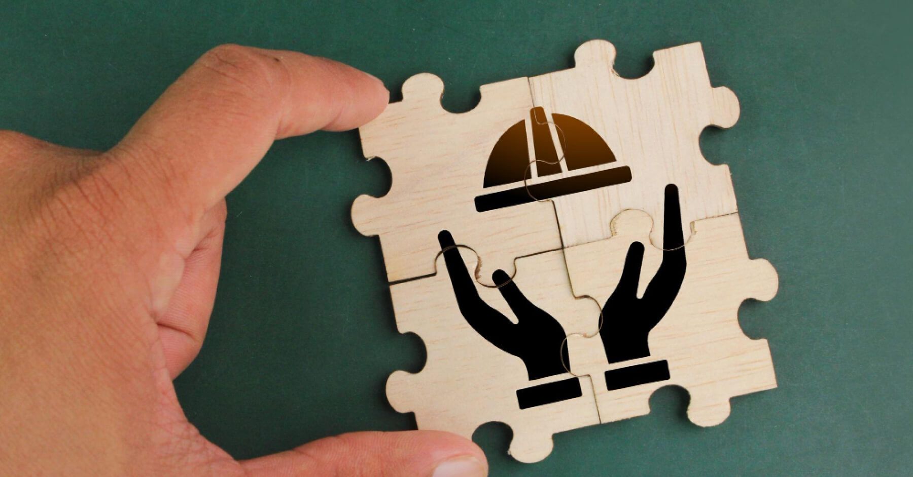 Wooden puzzle pieces of a working gear helmet