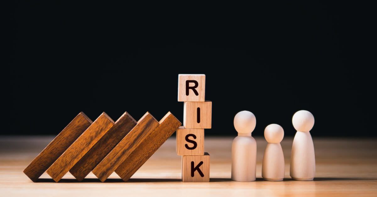 Wooden blocks that reads RISK
