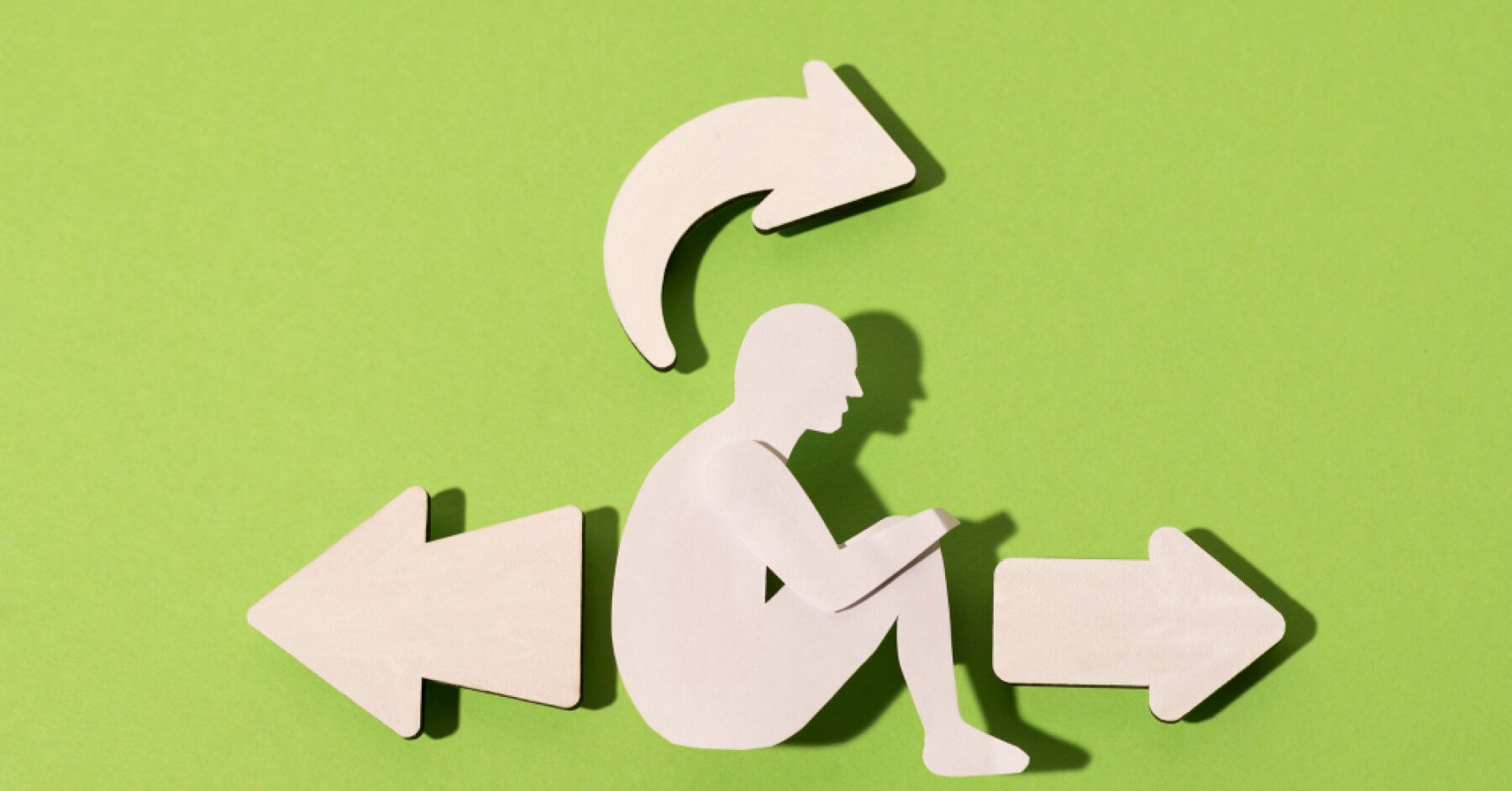 Cutouts of arrows around a person