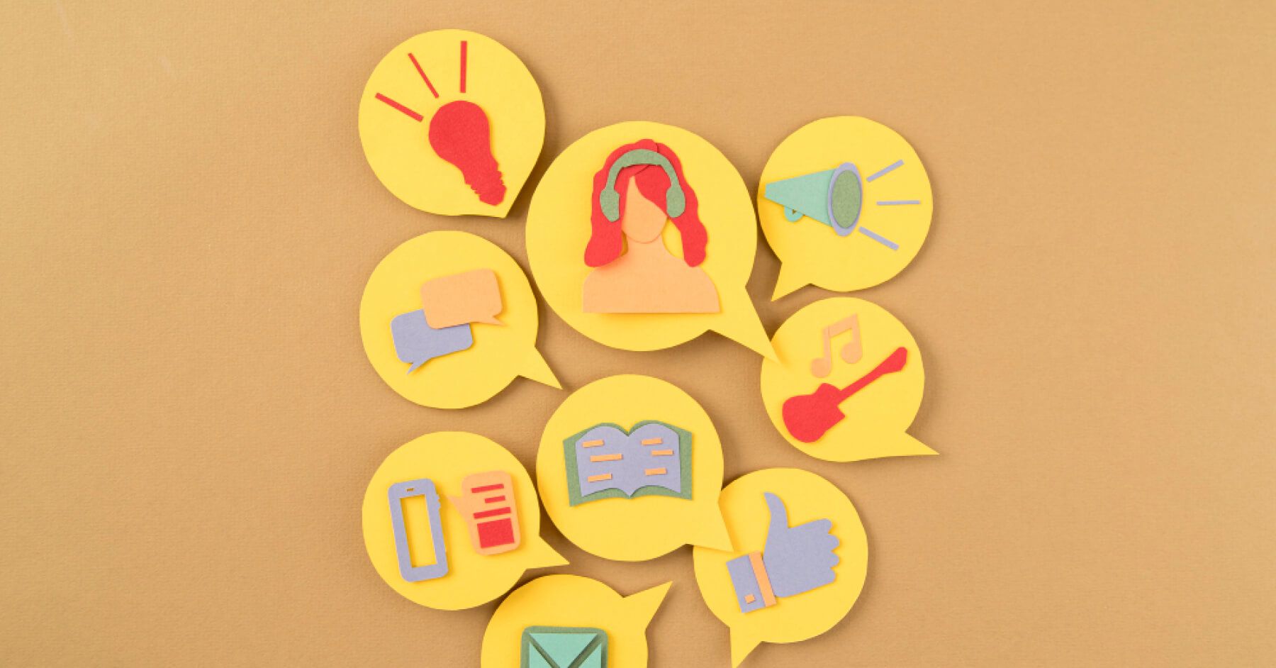 Conversation bubble cutouts with icons on them