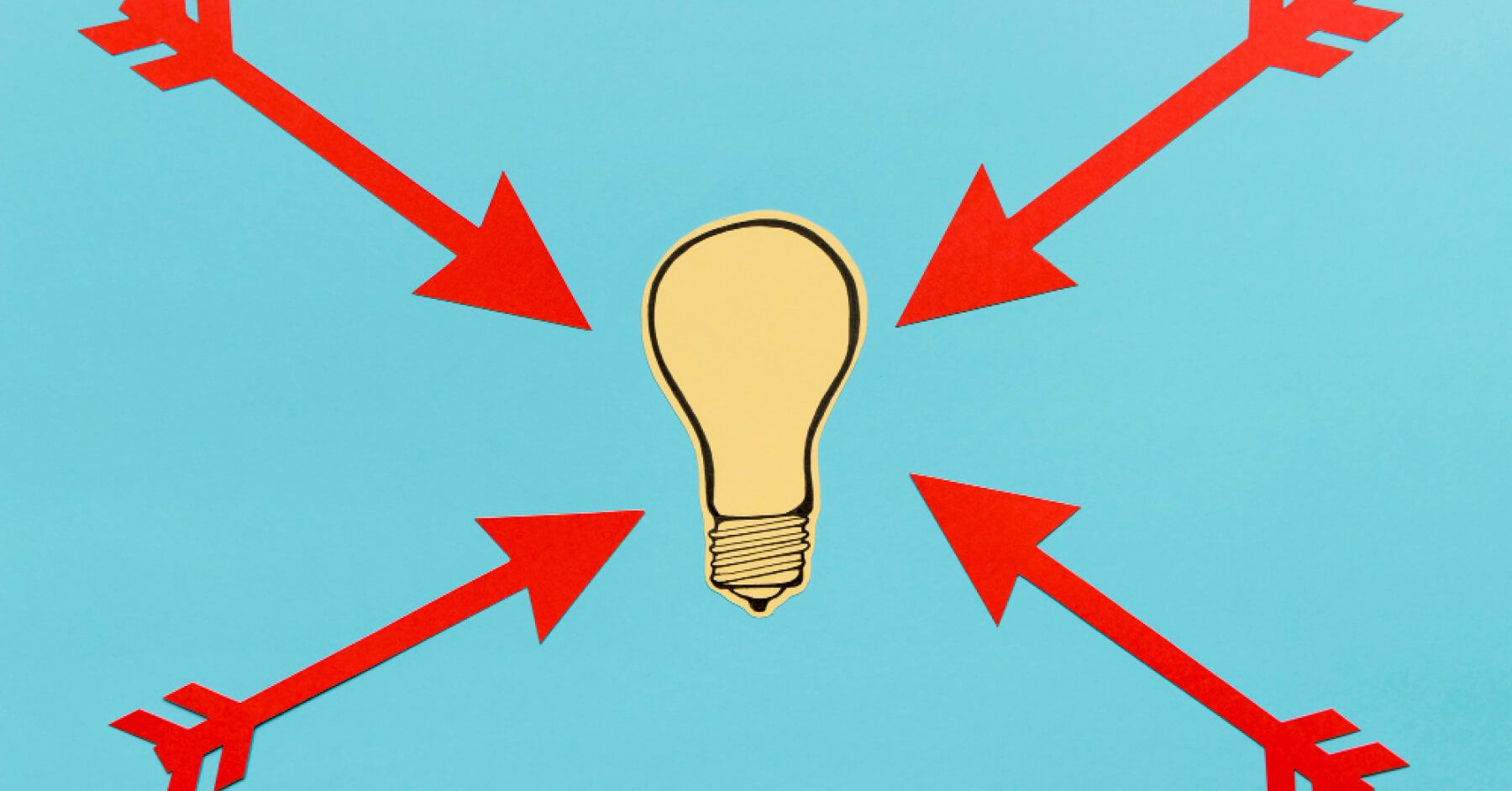 Yellow bulb cutout with red arrows pointing at it