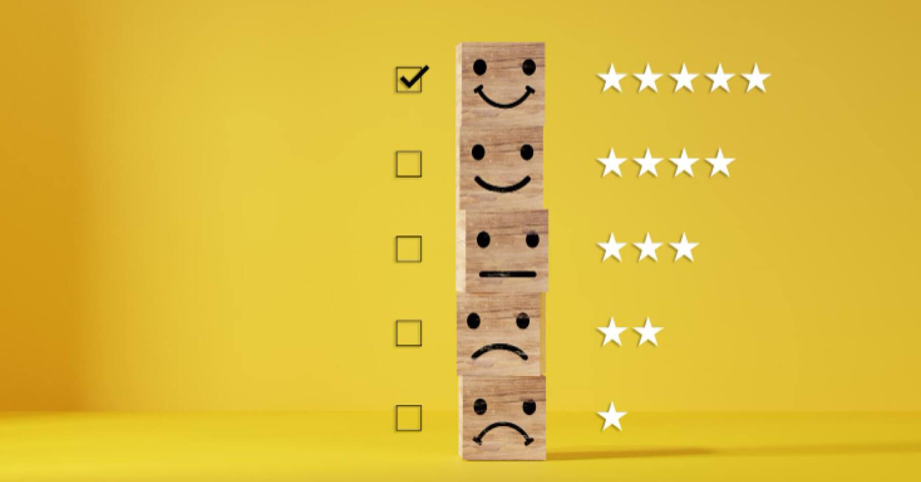 Stack of wooden blocks with reactions on them and checkboxes next to them