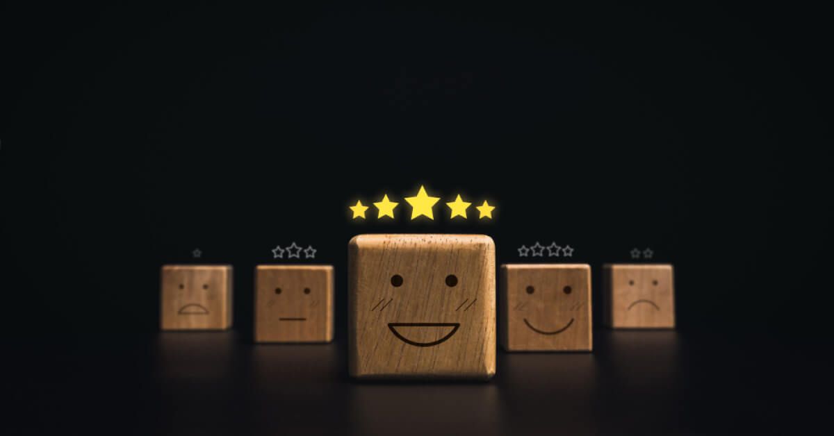 Wooden blocks with emojis and stars
