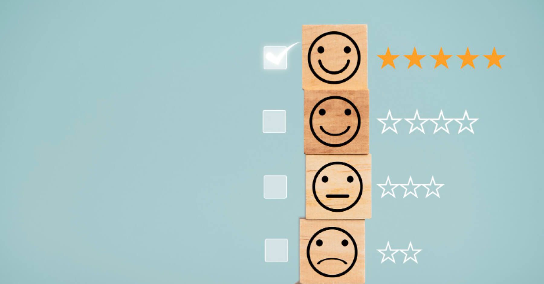 Wooden blocks of emotions and stars rating