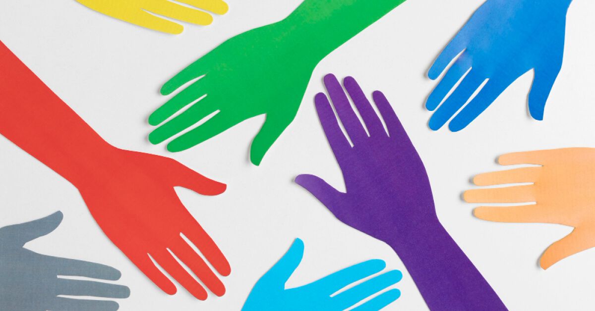 Paper hands of multiple colours
