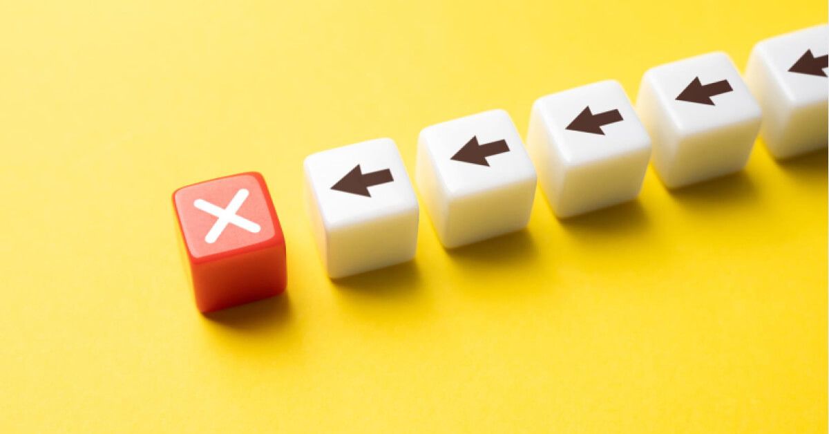 White arrows being blocked by a red X block