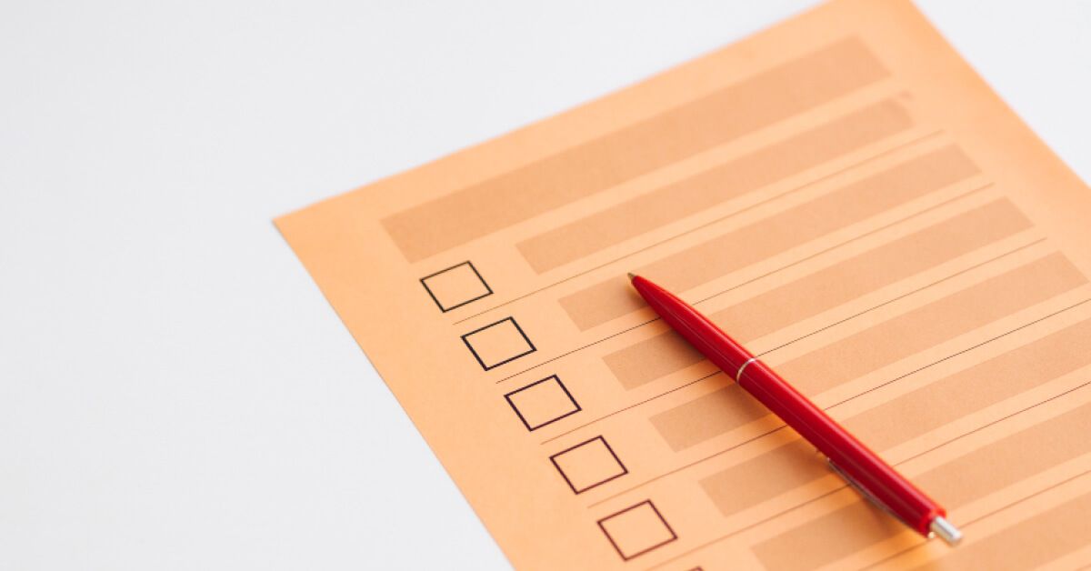 A checklist with a pen