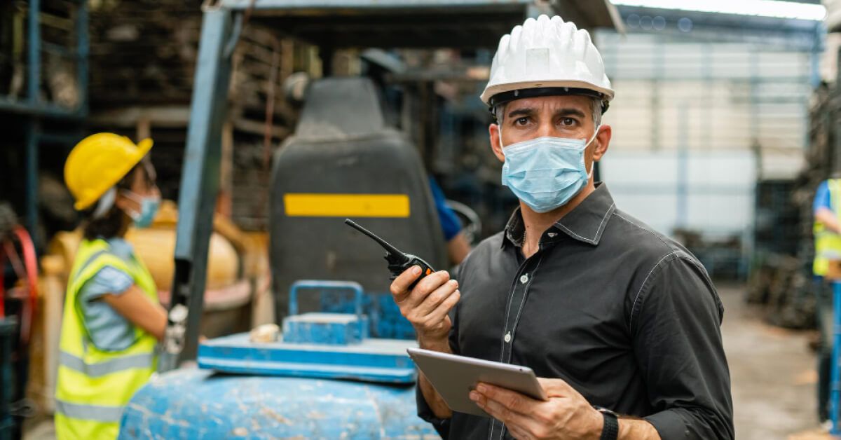 Manager on worksite giving instructions 
