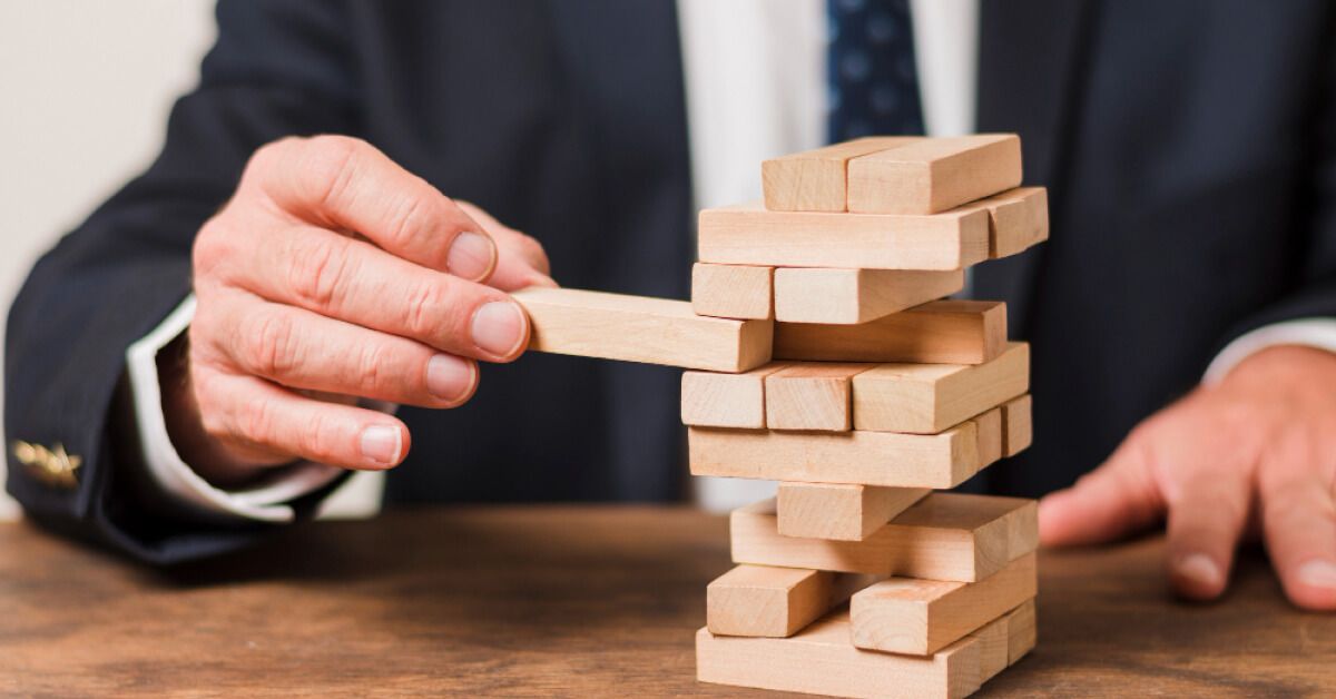 a office member playing wooden blocks 