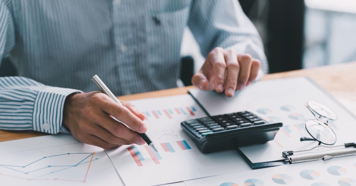 a man making calculations in office