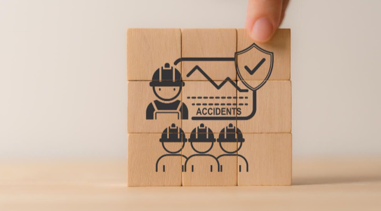 wooden blocks with workers on them