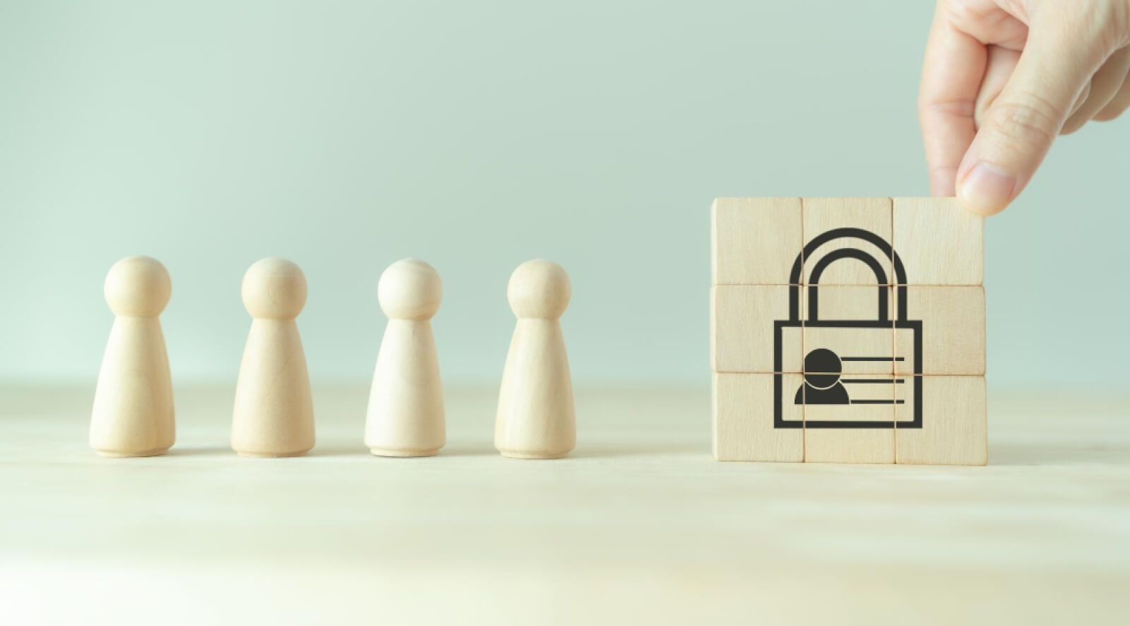 Wooden pawns and blocks with a lock on it