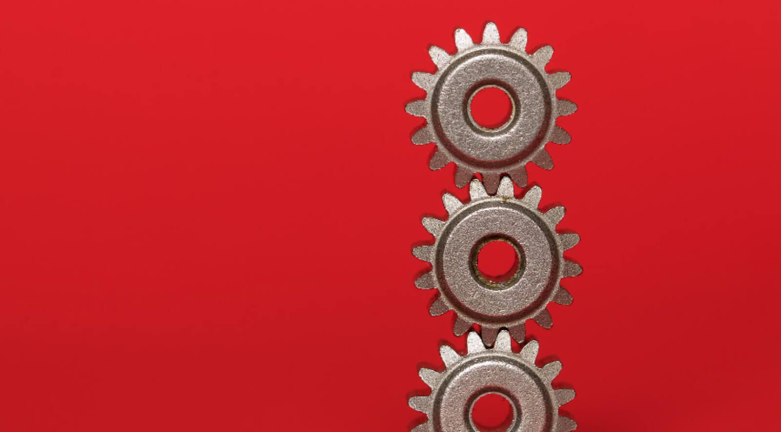 What are the core dimensions measured in employee engagement surveys?