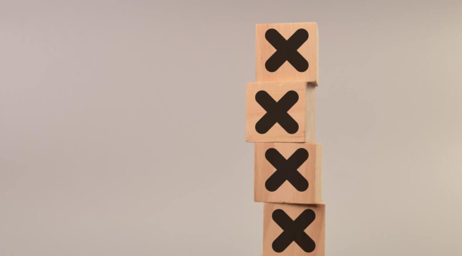 wooden blocks with into marks on it 