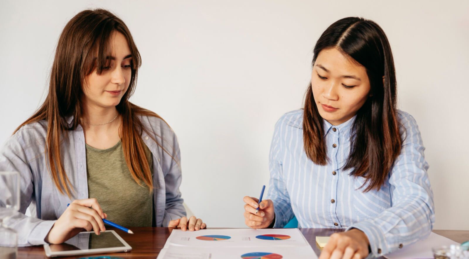 Two team members researching 