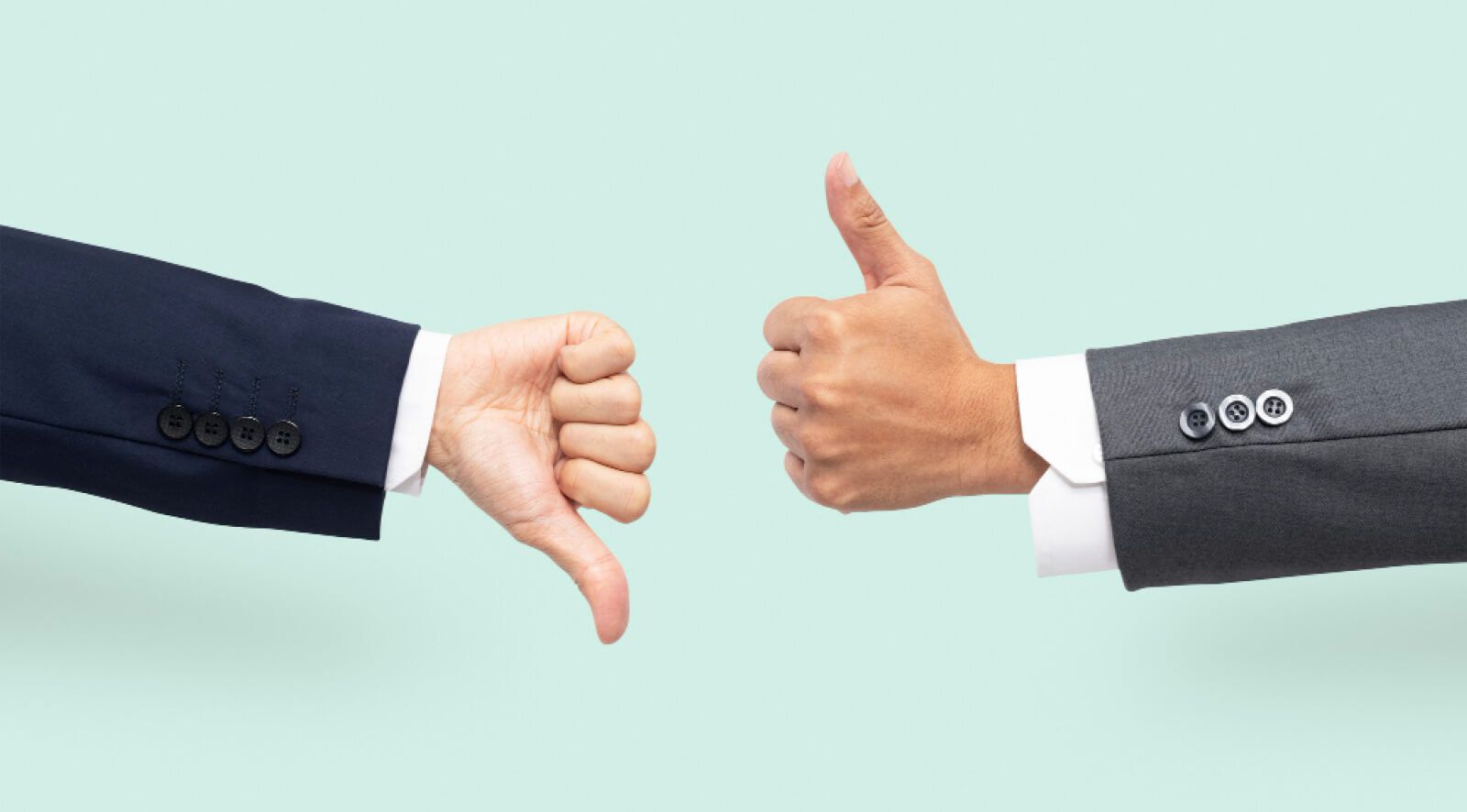 two thumbs one down and one up