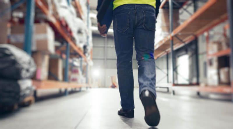worker walking in a warehouse