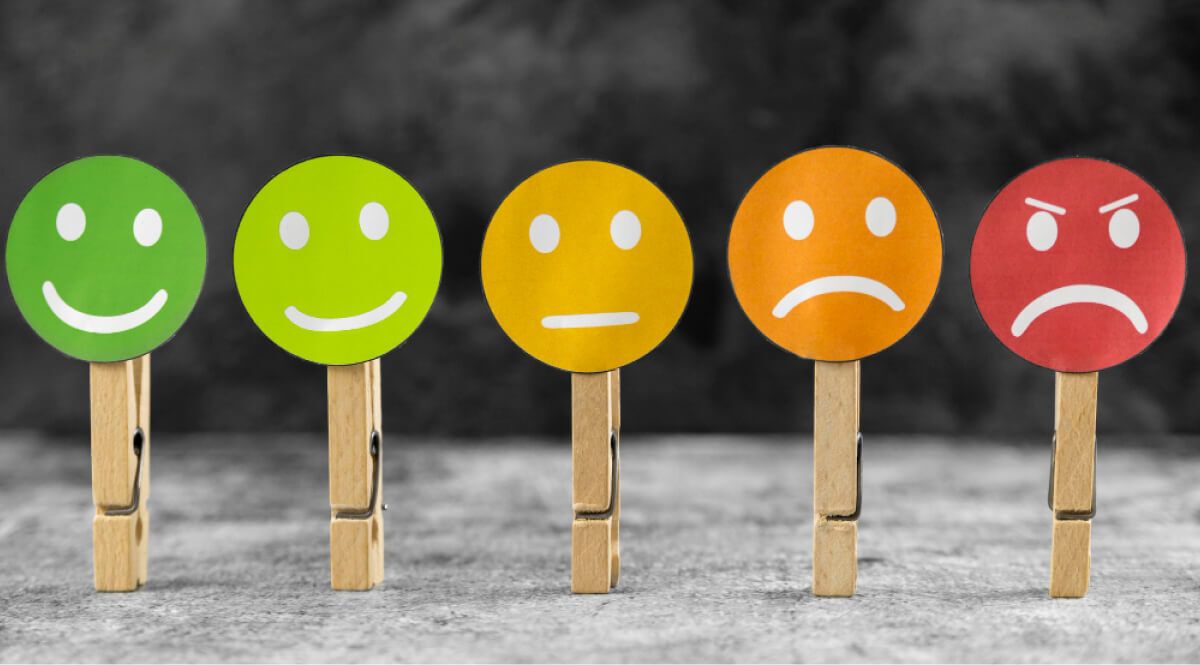 Emojis of all kinds stuck on a paper clip