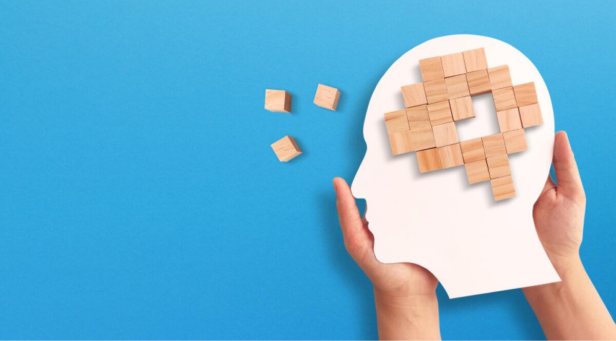 Mockup of a person's brain filled with wooden blocks