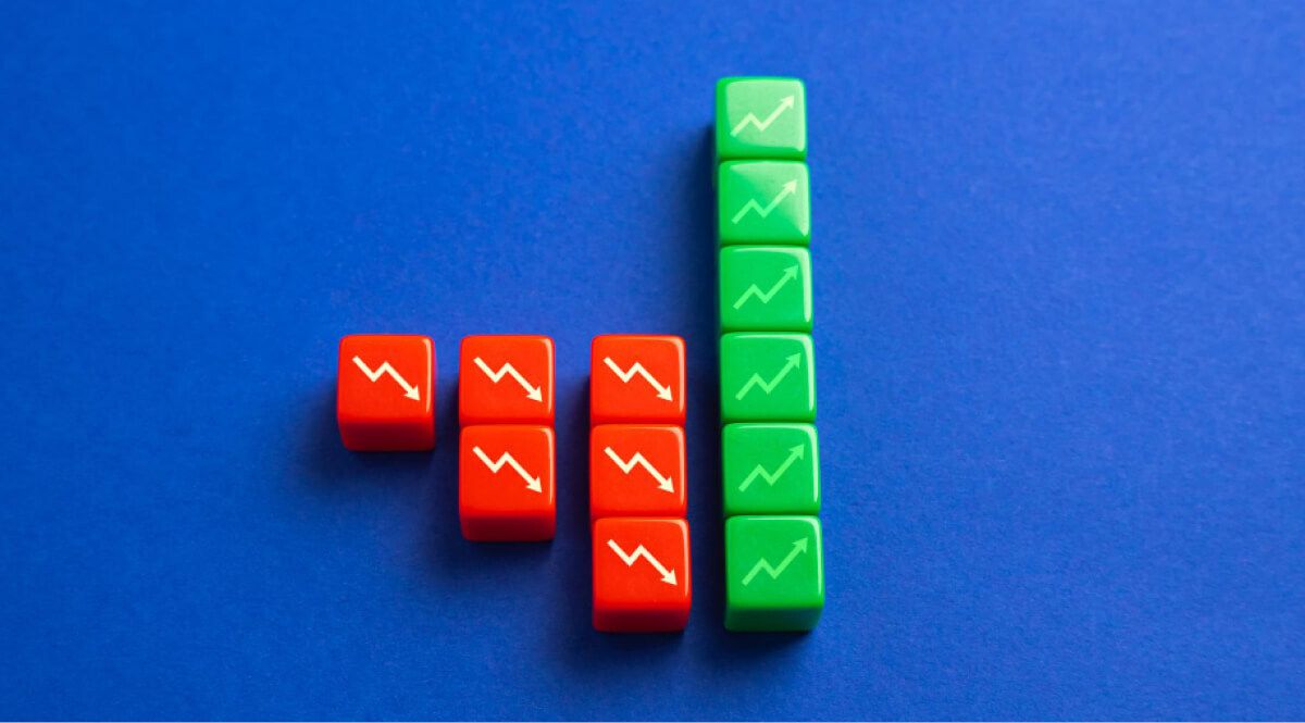 Plastic blocks of green and red symbolising growth and decline