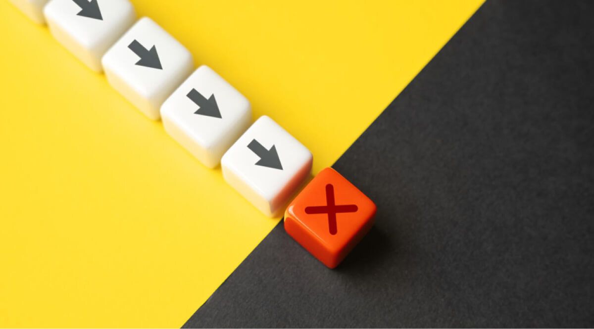 Arrows with a red block interrupting in the middle