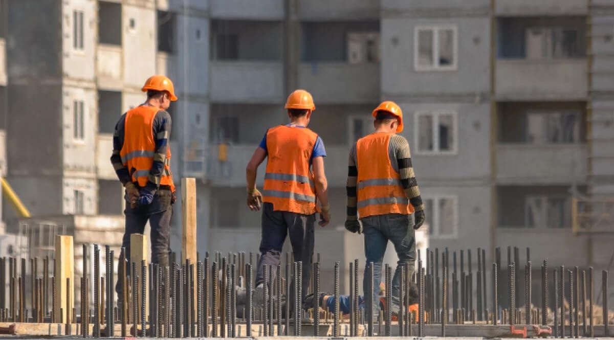 construction workers on a construction building