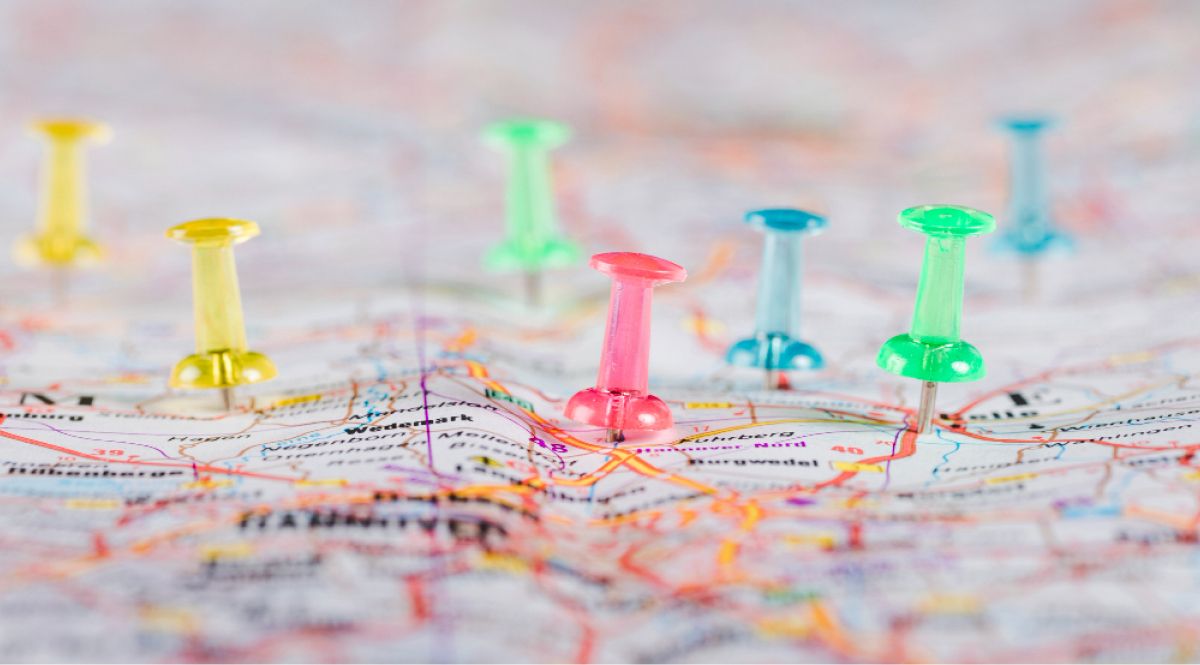 Various pins pinned on parts of a map