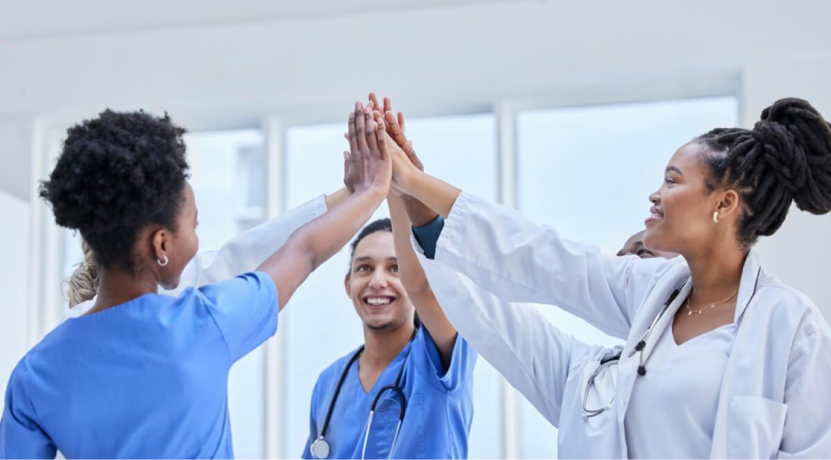 Doctors giving hifi to each other