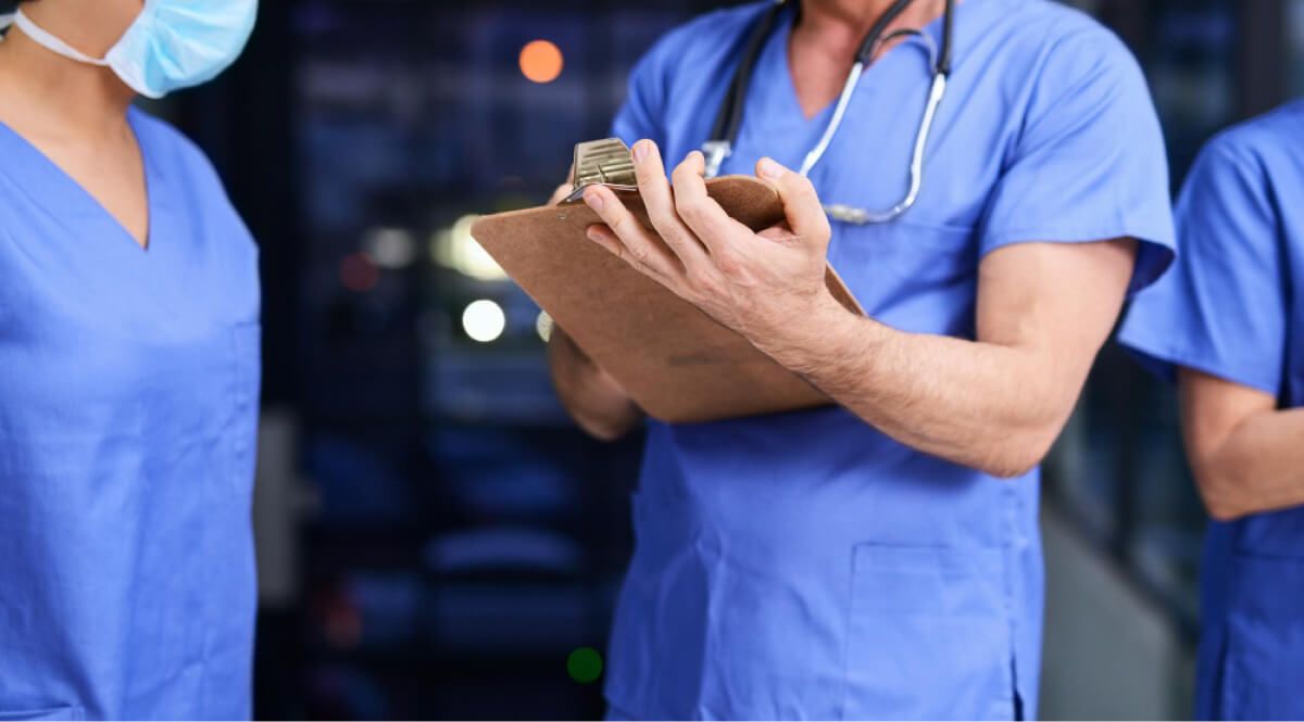 Hospital worker with a notepad