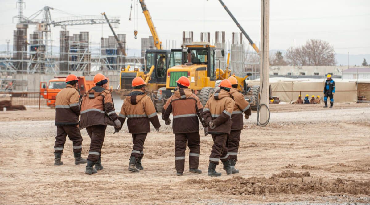 Construction workers walking