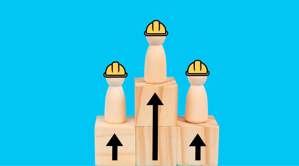 Mockup of wooden blocks wearing construction helmets